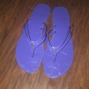 Purple Coach flip flops